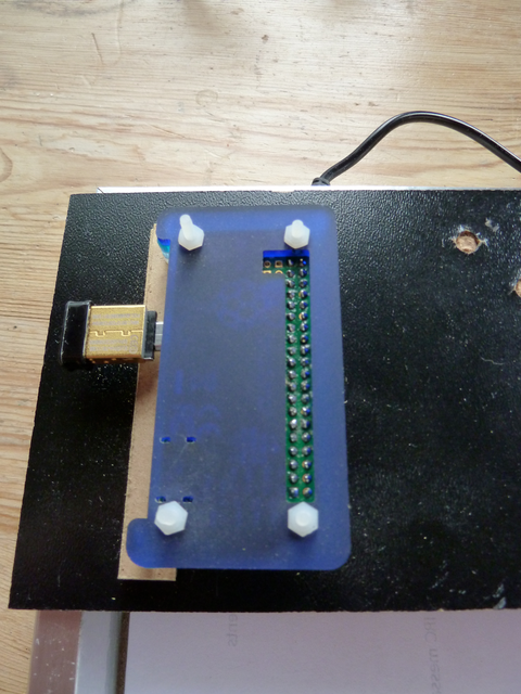 Pi Zero mounted to picture frame backing